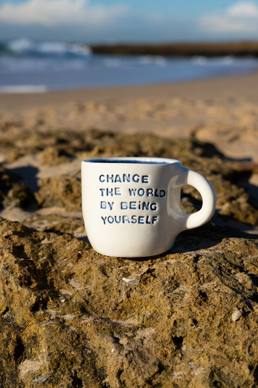 CHANGE THE WORLD MUG